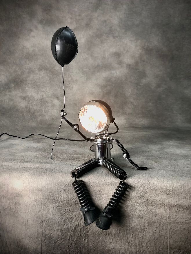 koplamp mensje met ballon